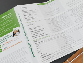 Inside of a UVM Health brochure showing a Medicare benefits chart